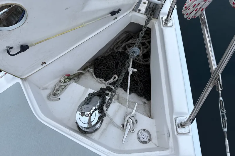 Slide: The Image of Anchor locker of a 2010 Hunter 36 sailboat with chain and rope. - 39