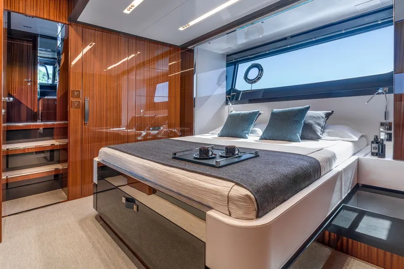 Slide: The Image of Luxurious interior of 2027 Riva 56' Rivale yacht with elegant bedroom design. - 10