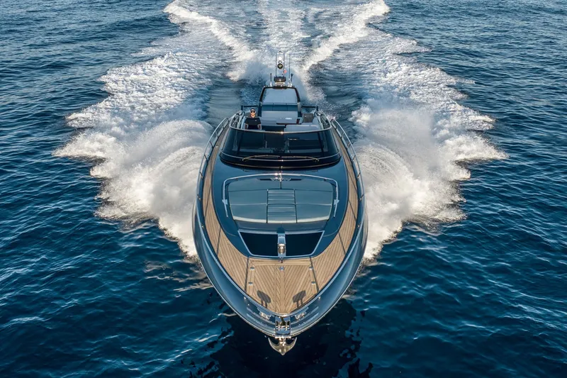 Slide: The Image of Luxurious 2027 Riva 56' Rivale yacht cruising on open water. - 5