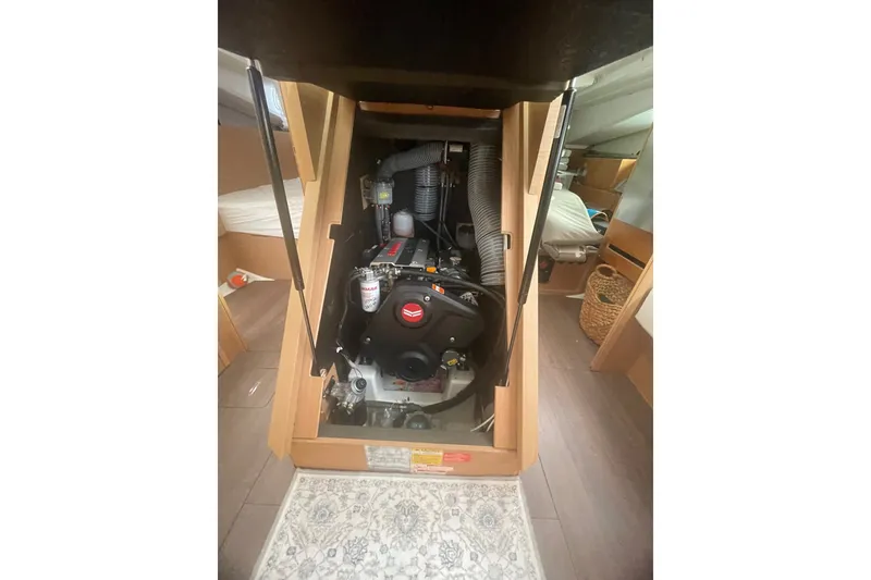 Slide: The Image of Engine compartment of 2022 Jeanneau Sun Odyssey 440 sailboat, showcasing interior details. - 14