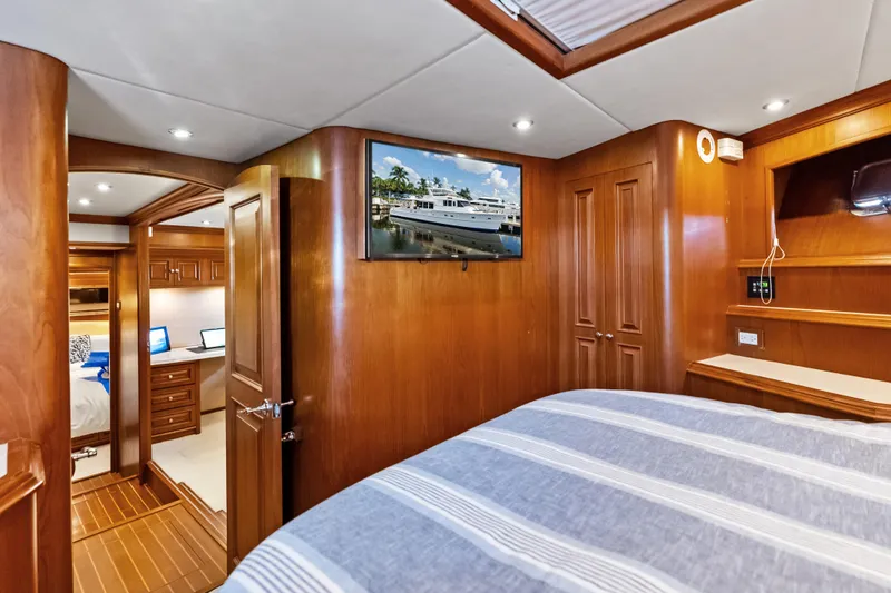 Slide: The Image of Luxurious 2005 Grand Banks 72 Aleutian RP yacht interior with wood paneling and modern amenities. - 110