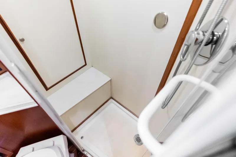 Slide: The Image of Shower area in 2005 Grand Banks 72 Aleutian RP yacht, featuring modern fixtures. - 107