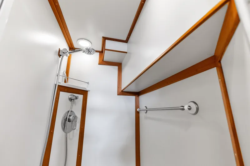 Slide: The Image of Shower area in 2005 Grand Banks 72 Aleutian RP yacht with modern fixtures. - 112