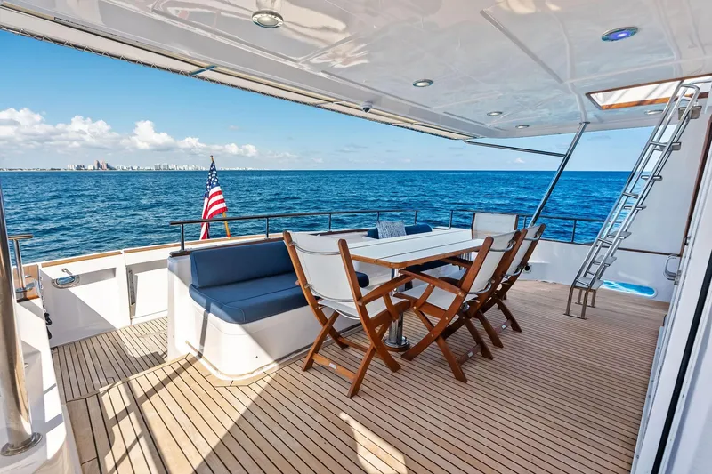 Slide: The Image of Luxurious 2005 Grand Banks 72 Aleutian RP yacht deck with ocean view and seating area. - 173