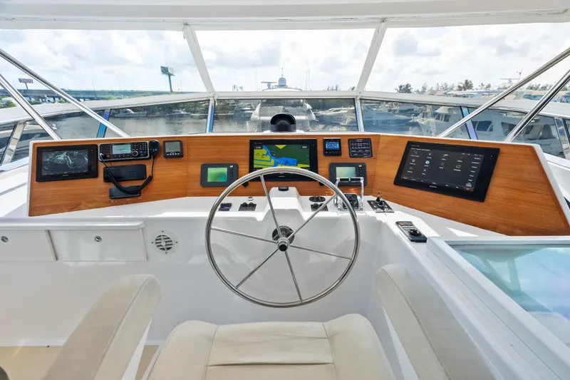 Slide: The Image of Helm of 2005 Grand Banks 72 Aleutian RP yacht with modern navigation equipment. - 140