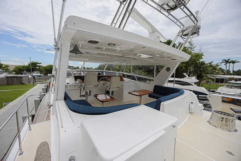 Slide: The Image of 2005 Grand Banks 72 Aleutian RP yacht with spacious flybridge and seating area. - 19