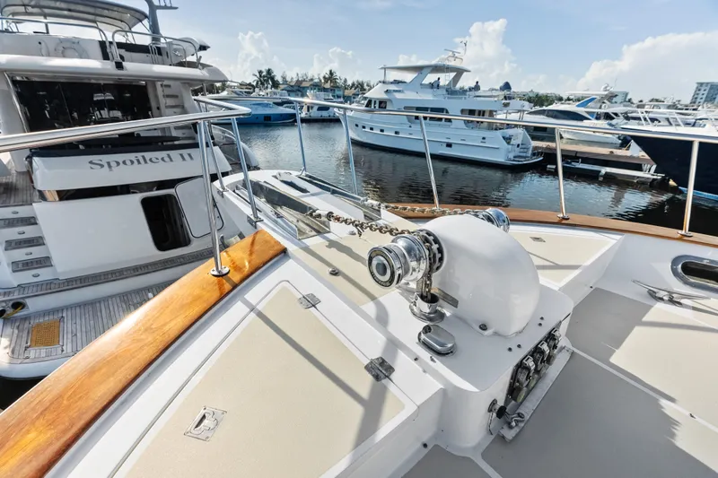 Slide: The Image of 2005 Grand Banks 72 Aleutian RP yacht docked at marina, featuring deck and winch. - 120