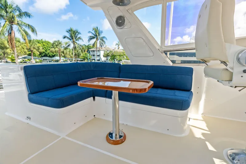 Slide: The Image of Luxurious seating area on 2005 Grand Banks 72 Aleutian RP yacht with blue cushions. - 138