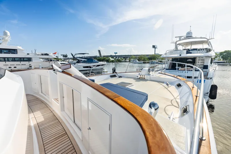 Slide: The Image of 2005 Grand Banks 72 Aleutian RP yacht docked in a sunny marina. - 116