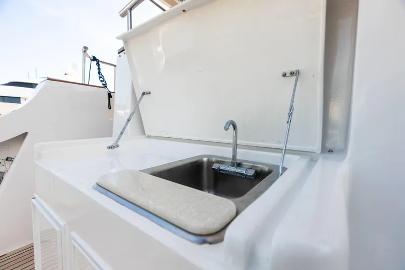 Slide: The Image of Outdoor sink on 2005 Grand Banks 72 Aleutian RP yacht deck. - 44