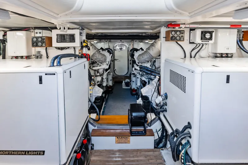 Slide: The Image of Engine room of 2005 Grand Banks 72 Aleutian RP yacht, featuring Northern Lights generators. - 143