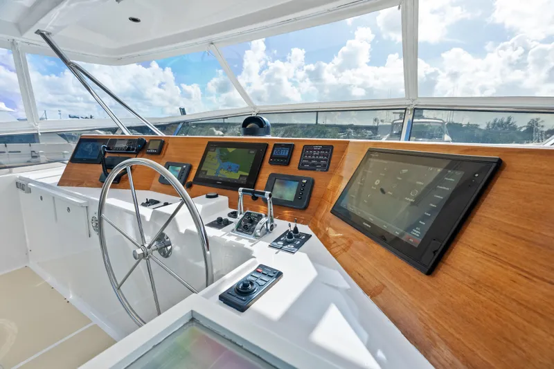 Slide: The Image of Helm of 2005 Grand Banks 72 Aleutian RP yacht with modern navigation equipment. - 141