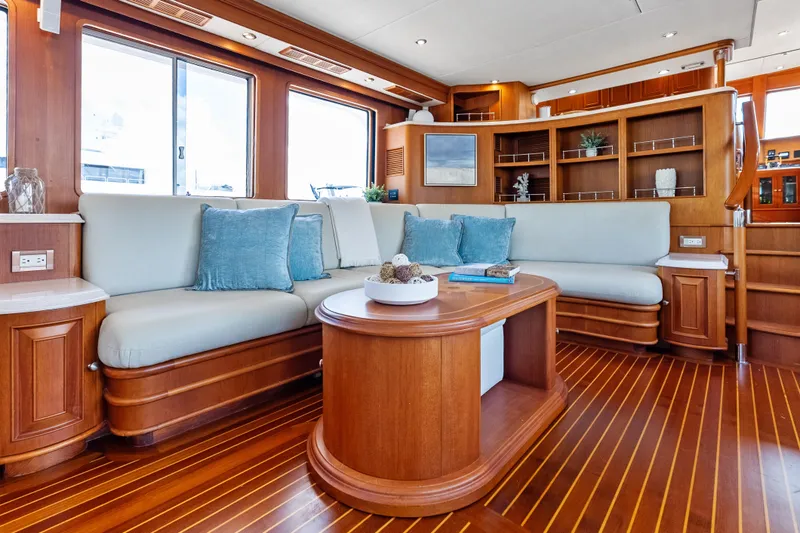 Slide: The Image of Luxurious 2005 Grand Banks 72 Aleutian RP yacht interior with elegant wood finish and plush seating. - 67