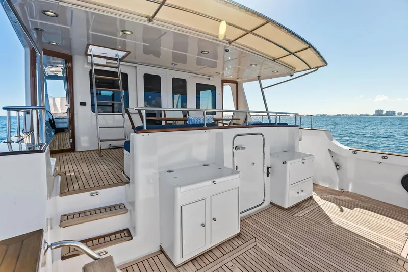 Slide: The Image of Luxurious 2005 Grand Banks 72 Aleutian RP yacht deck with ocean view. - 178