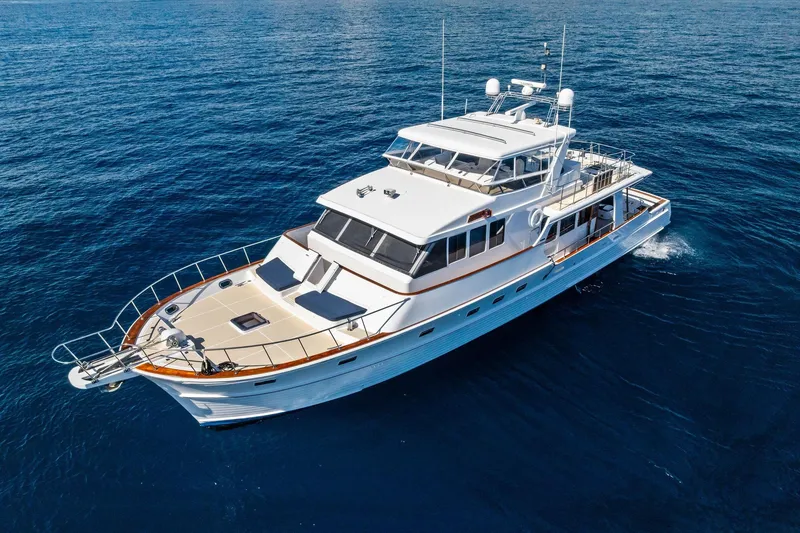 Slide: The Image of 2005 Grand Banks 72 Aleutian RP yacht cruising on open sea. - 30