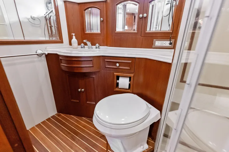 Slide: The Image of Luxurious wooden bathroom interior on 2005 Grand Banks 72 Aleutian RP yacht. - 96