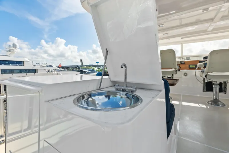 Slide: The Image of 2005 Grand Banks 72 Aleutian RP yacht with outdoor sink and seating area. - 131