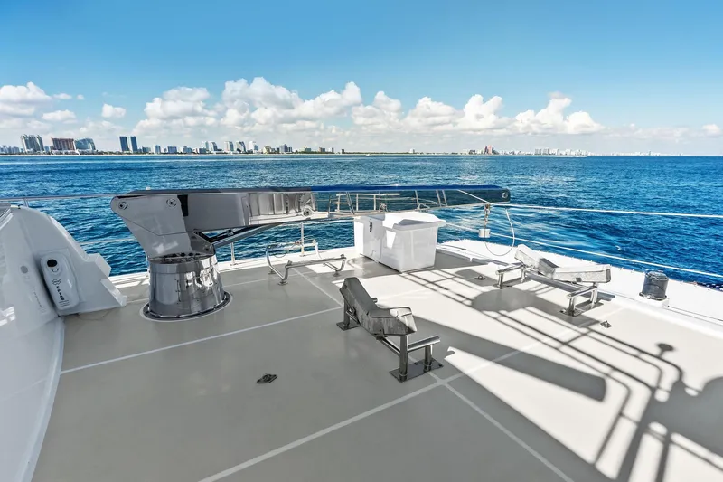 Slide: The Image of Deck view of 2005 Grand Banks 72 Aleutian RP yacht with city skyline in background. - 164