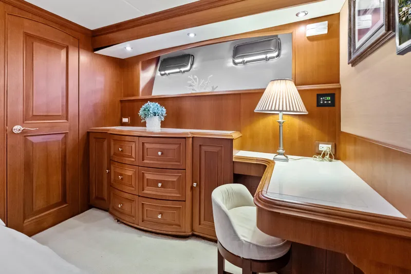 Slide: The Image of Luxurious wooden interior of 2005 Grand Banks 72 Aleutian RP yacht cabin. - 100