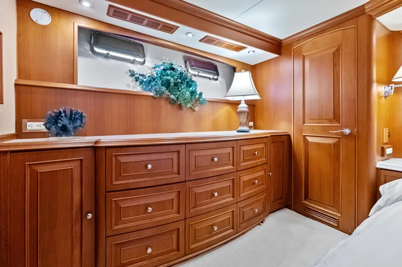 Slide: The Image of Luxurious wooden interior of 2005 Grand Banks 72 Aleutian RP yacht cabin. - 102