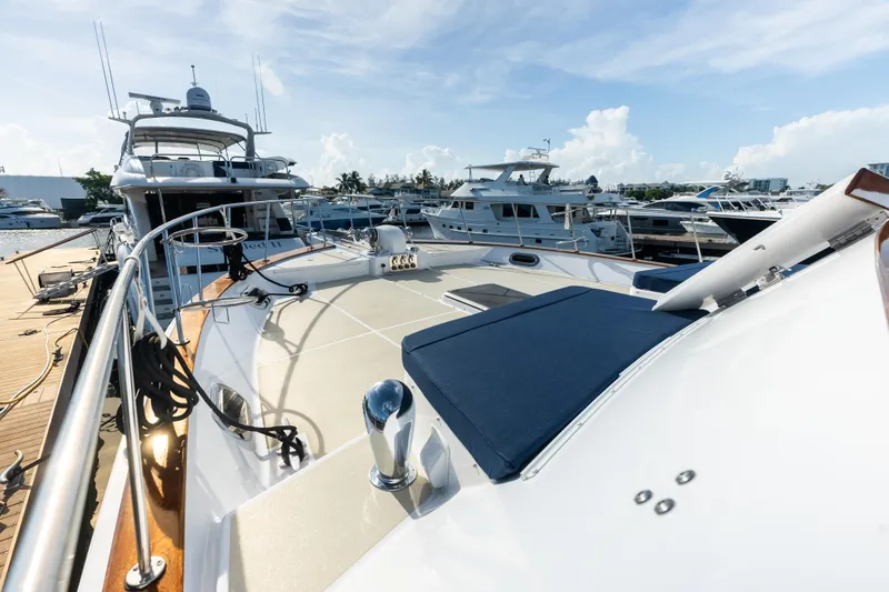 Slide: The Image of 2005 Grand Banks 72 Aleutian RP yacht docked at marina under clear sky. - 117