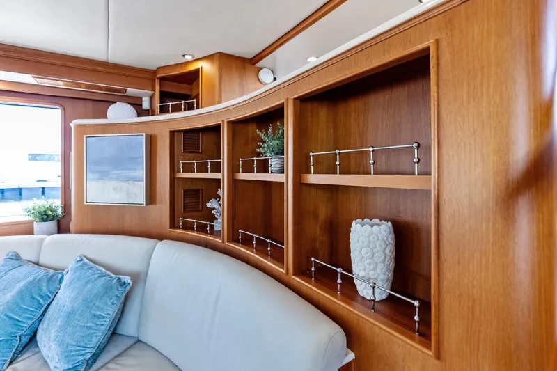 Slide: The Image of Luxurious interior of 2005 Grand Banks 72 Aleutian RP yacht with elegant wood shelving. - 64