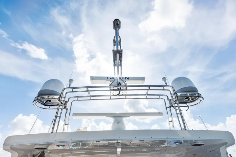 Slide: The Image of Grand Banks 72 Aleutian RP 2005 yacht radar and antennas against a cloudy sky. - 129