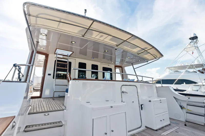 Slide: The Image of 2005 Grand Banks 72 Aleutian RP yacht, featuring spacious deck and modern design elements. - 41