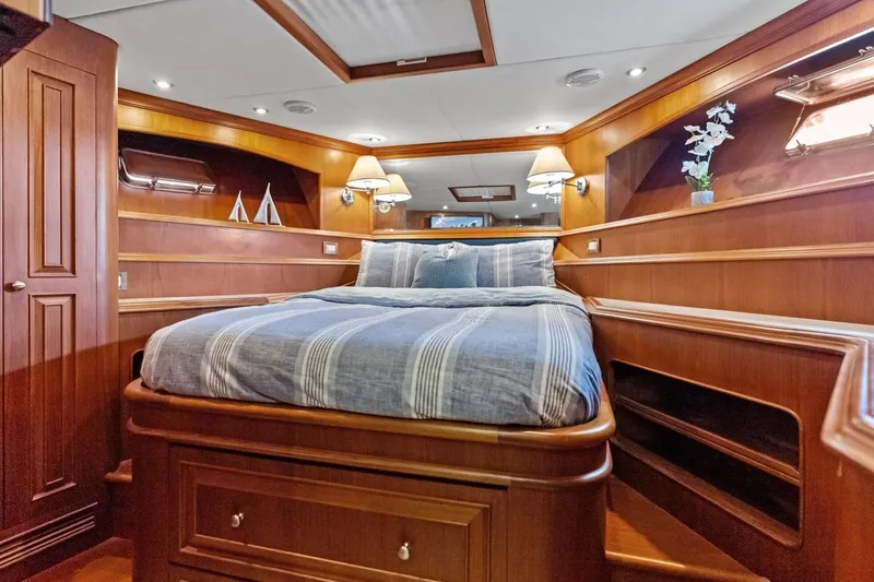 Slide: The Image of Luxurious 2005 Grand Banks 72 Aleutian RP yacht bedroom with elegant wood finish. - 108
