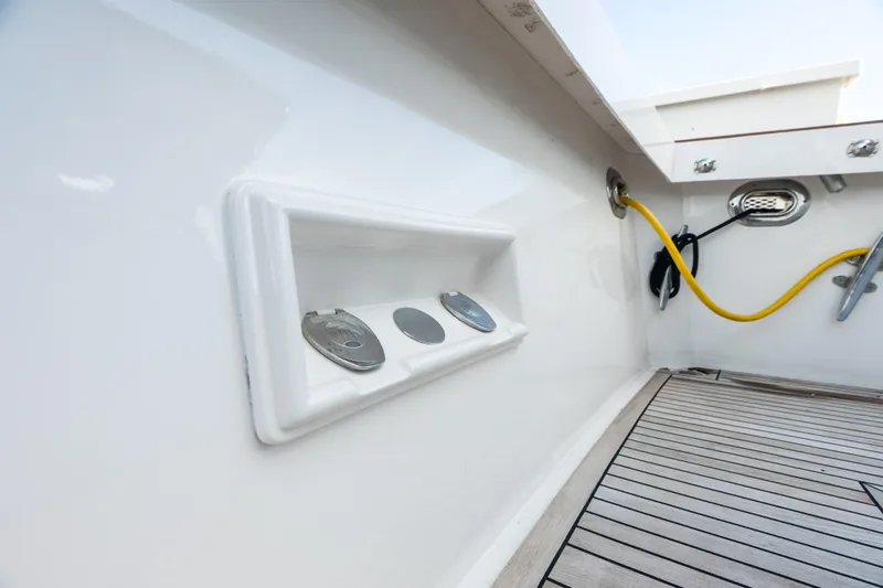 Slide: The Image of Deck fittings and utility connections on a 2005 Grand Banks 72 Aleutian RP yacht. - 46