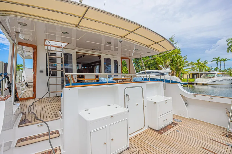 Slide: The Image of 2005 Grand Banks 72 Aleutian RP yacht with spacious deck and elegant design. - 7