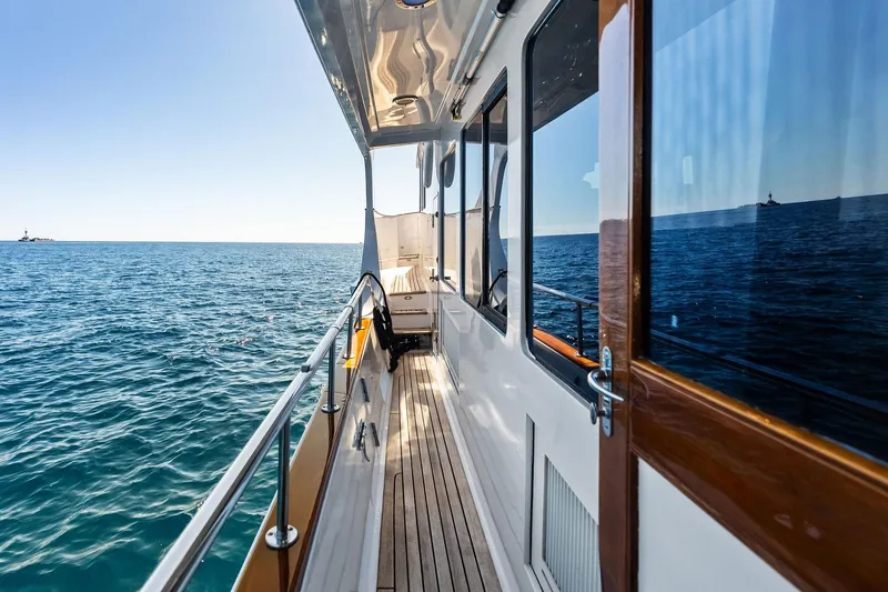 Slide: The Image of 2005 Grand Banks 72 Aleutian RP yacht deck with ocean view. - 166