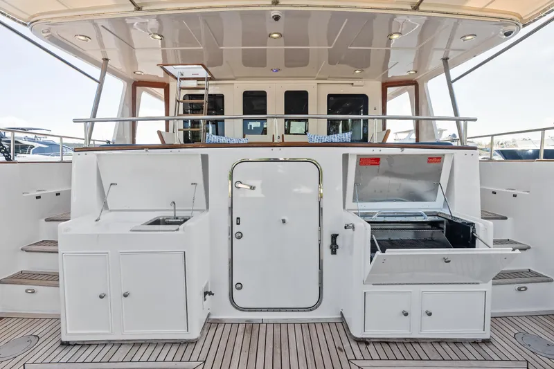 Slide: The Image of Outdoor kitchen on 2005 Grand Banks 72 Aleutian RP yacht with sink and grill. - 42