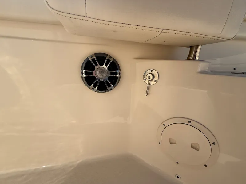 Slide: The Image of Close-up of a speaker and outlet on a Grady-White Canyon 306 boat. - 32