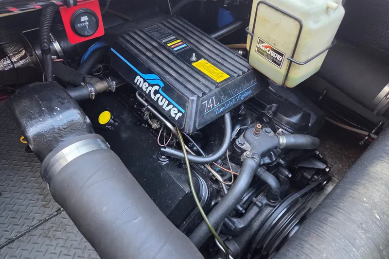 Slide: The Image of Engine compartment of a 1997 Regal Commodore 402 with MerCruiser 7.4L engine. - 41