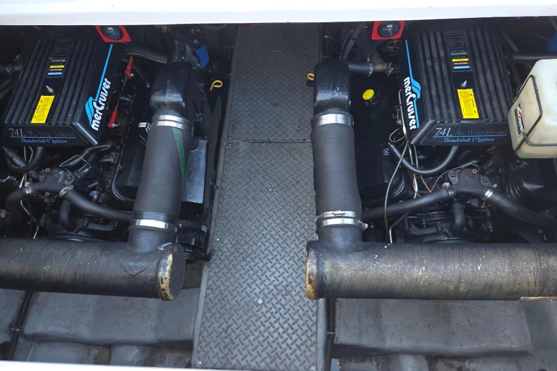 Slide: The Image of Engine compartment of a 1997 Regal Commodore 402 with twin MerCruiser 7.4L engines. - 35