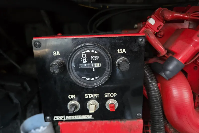 Slide: The Image of Control panel of a 1997 Regal Commodore 402 with Westerbeke engine hour meter. - 36