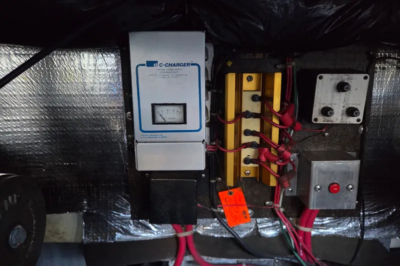 Slide: The Image of Electrical panel with C-Charger in 1997 Regal Commodore 402 boat. - 40