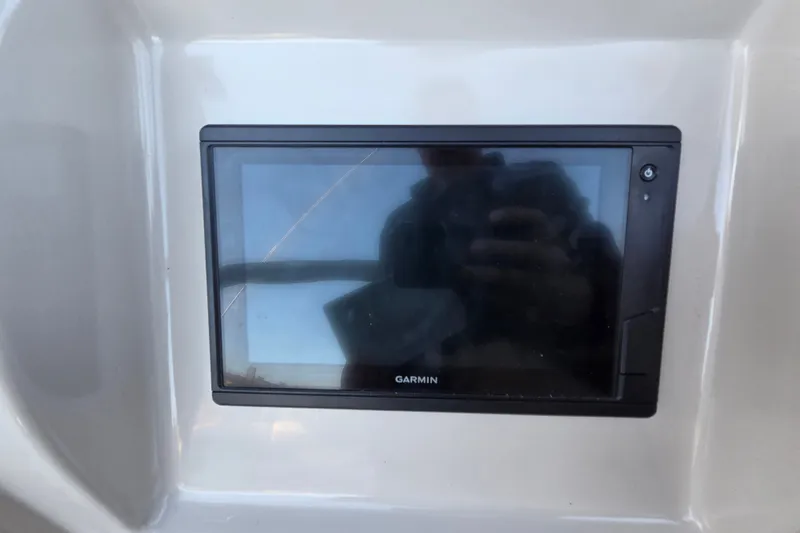 Slide: The Image of Garmin navigation display on 1997 Regal Commodore 402 boat dashboard. - 22