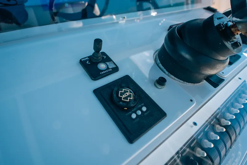 Slide: The Image of Control panel of a 2013 Invincible 42 Open Fisherman boat. - 33