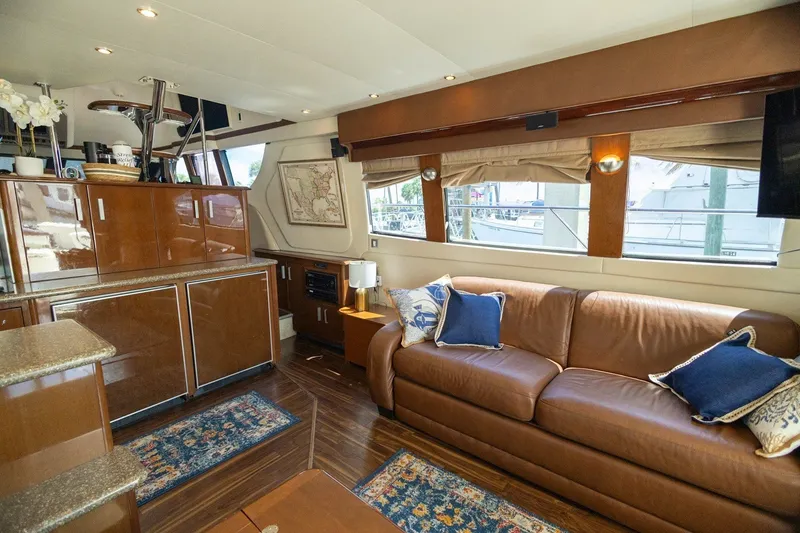 Slide: The Image of Luxurious interior of 2007 Carver 56 Voyager SE yacht with leather sofa and elegant decor. - 9