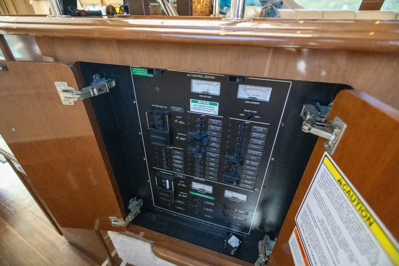 Slide: The Image of Electrical control panel inside a 2007 Carver 56 Voyager SE yacht. - 18