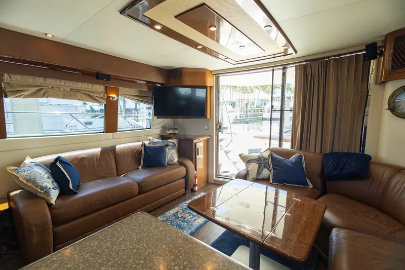 Slide: The Image of Luxurious interior of 2007 Carver 56 Voyager SE yacht with leather seating and modern decor. - 8