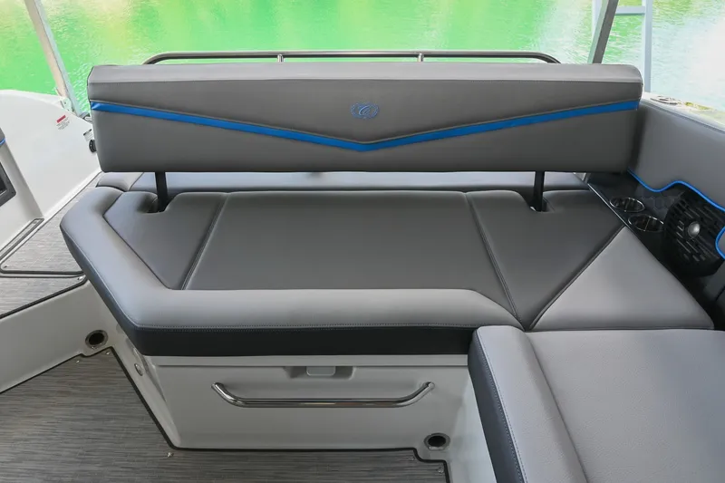 Slide: The Image of Luxurious seating on 2022 Cobalt R8 Surf boat with sleek gray and blue design. - 19