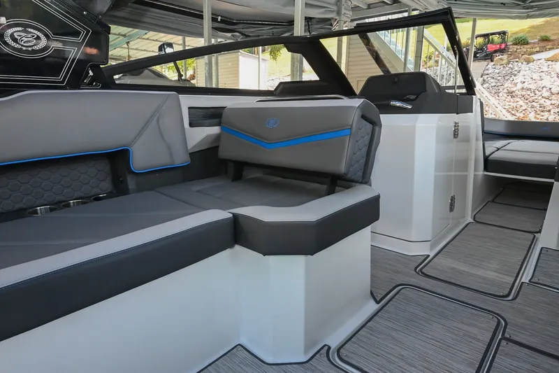 Slide: The Image of Interior of 2022 Cobalt R8 Surf boat with modern seating and sleek design. - 22
