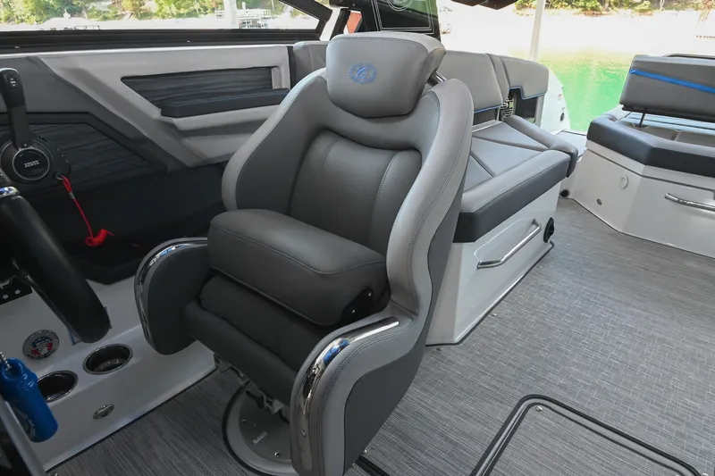 Slide: The Image of Captain's seat in 2022 Cobalt R8 Surf boat, featuring sleek design and comfortable upholstery. - 33