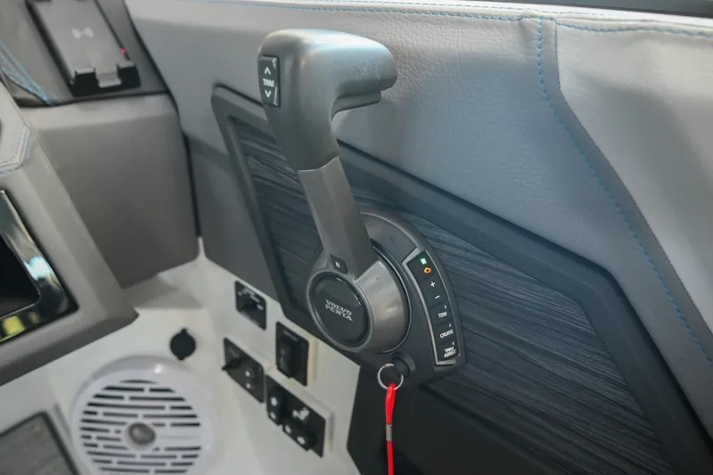 Slide: The Image of Throttle control panel of 2022 Cobalt R8 Surf boat with Volvo Penta branding. - 40