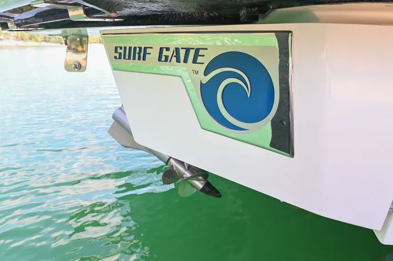 Slide: The Image of 2022 Cobalt R8 Surf boat with Surf Gate feature on water. - 6