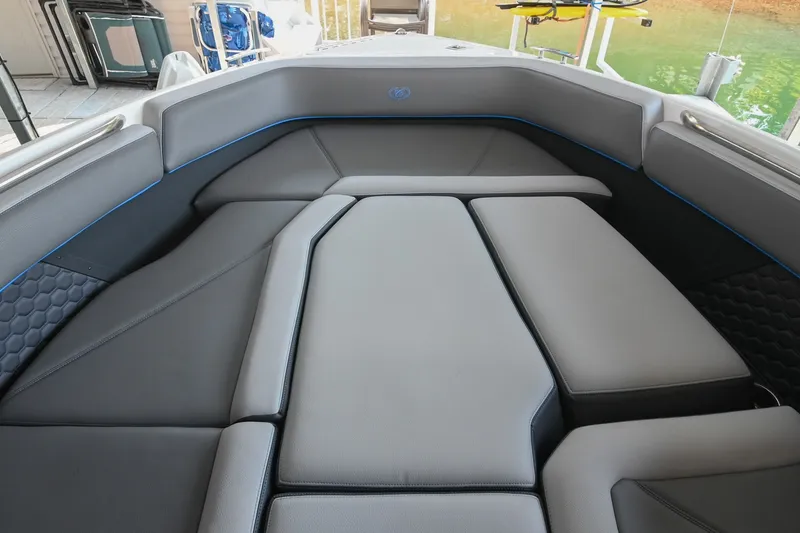 Slide: The Image of 2022 Cobalt R8 Surf boat interior with sleek, modern seating design. - 45