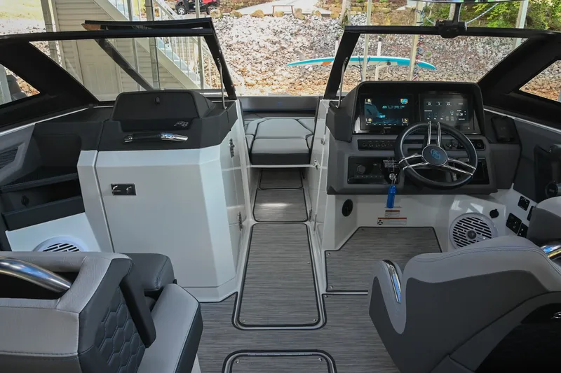 Slide: The Image of 2022 Cobalt R8 Surf boat interior with modern dashboard and seating. - 27